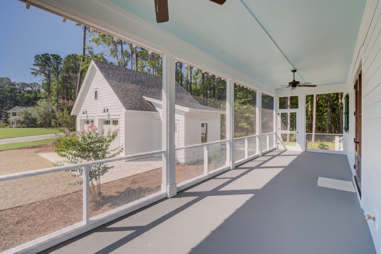 Front Light's Beaufort model wraparound screen porch upgrade option adds an additional 299 sq. ft. of living space to enjoy the outdoors in the Lowcountry. by Front Light Building Co. | Outdoor Photos | Porch | Landscaping | Landscape Design | Outdoor Living Space | Porch Design Ideas | Outdoor Living Space Ideas | Backyard Design