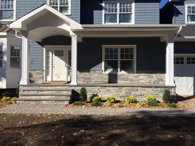 Front entry re-do with new front steps & entryway, walkway, driveway (blacktop with paver inlay)