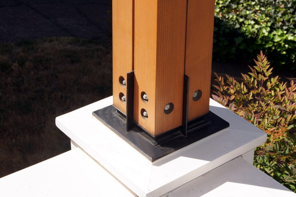 Front porch fir column detail, with seating railing. Lyons Hunter Williams: Architecture