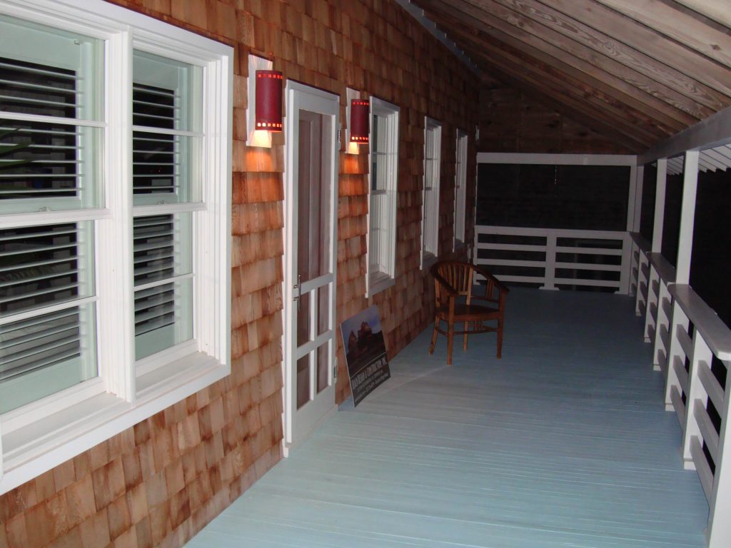 Front porch of customized historic renovation by Charley Pereira, Beach Design & Construction, Inc.