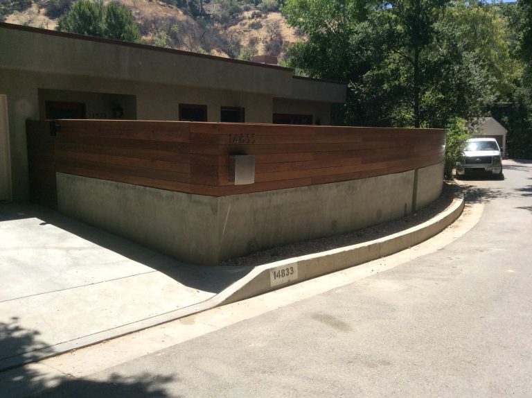 Front yard remodeling. Project is including: block wall with smooth stucco finish, wood fence from Ipe on top of the new block wall, slate tile, fire pit, build in BBQ, wood deck from Trex and drop in Jacuzzi.