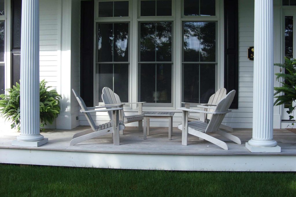 Furniture is Gloster teak....grays naturally and will last a lifetime. Very comfortable and smooth to the touch.