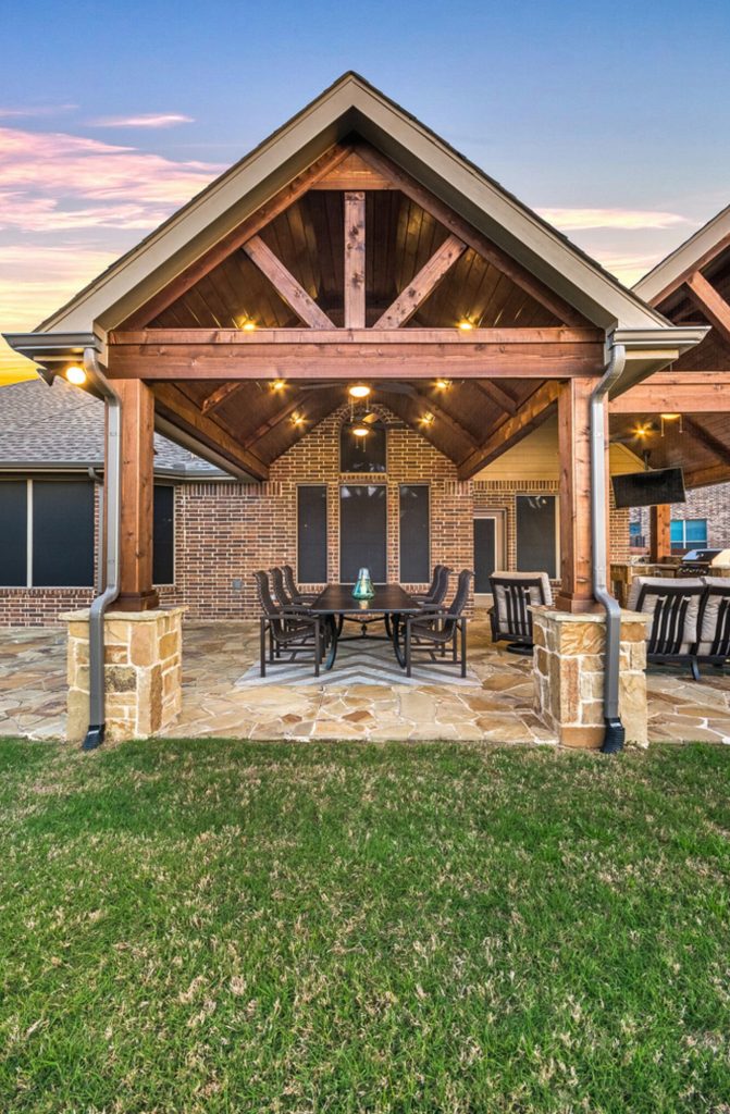 Gorgeous outdoor dining area with American Nut Brown ceiling, cedar stain: dark walnut, flooring: Oklahoma Flagstone, and dual ceiling fans to keep the owner cool in the summertime .

Click Photography by TCP Custom Outdoor Living | Outdoor Kitchens | Backyard Design | Outdoor Living Spaces | Landscape Design