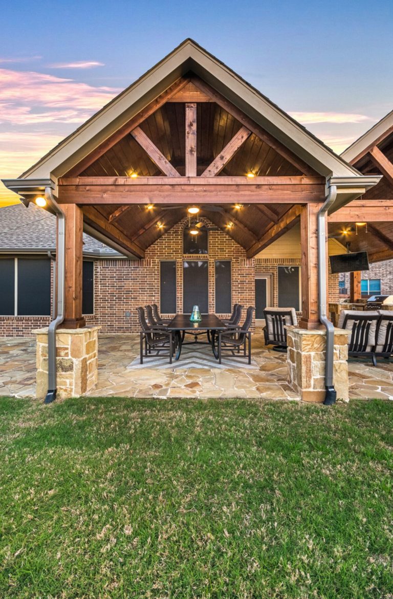 Gorgeous outdoor dining area with American Nut Brown ceiling, cedar stain: dark walnut, flooring: Oklahoma Flagstone, and dual ceiling fans to keep the owner cool in the summertime .

Click Photography by TCP Custom Outdoor Living | Outdoor Kitchens | Backyard Design | Outdoor Living Spaces | Landscape Design