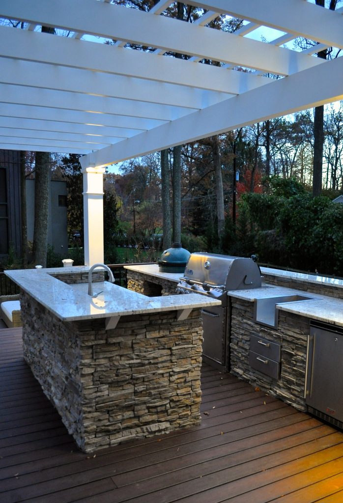 Ground view of deck. Outwardly visible structural elements are wrapped in pVC. Photo Credit: Johnna Harrison