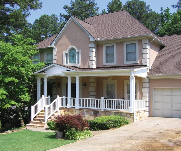 Half front porch with curved entry and square columns. Designed and built by Georgia Front Porch.
