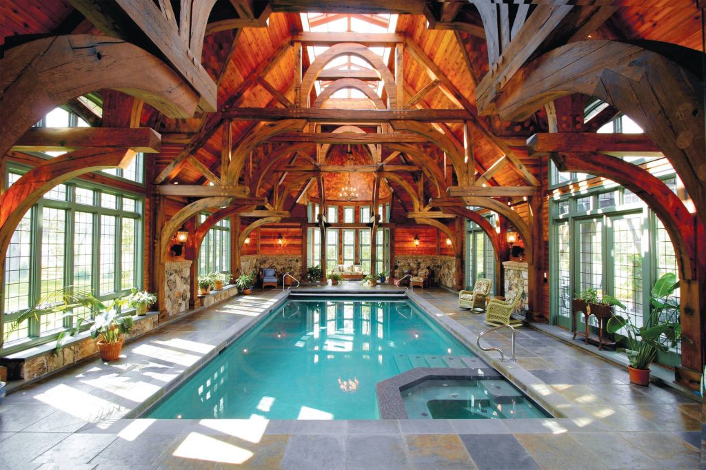 Hot tub - huge rustic indoor rectangular and stamped concrete natural hot tub idea in New York