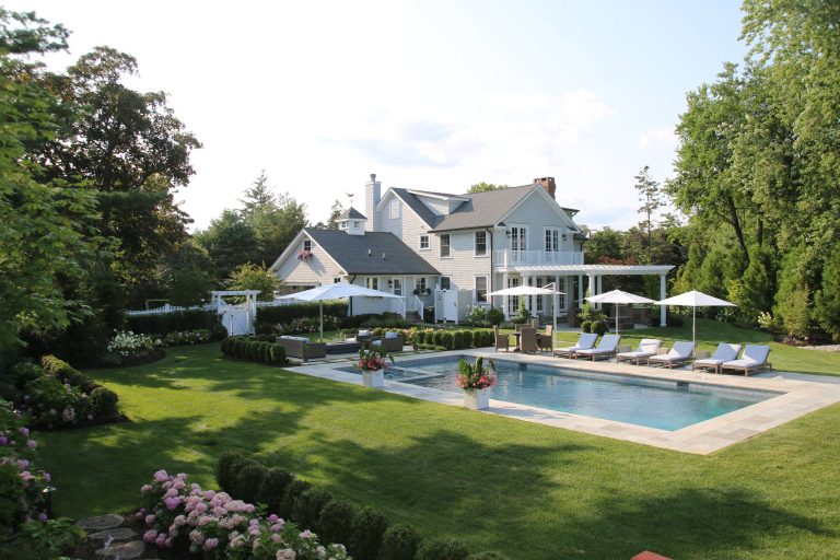 Hot tub - huge traditional backyard stone and rectangular lap hot tub idea in New York