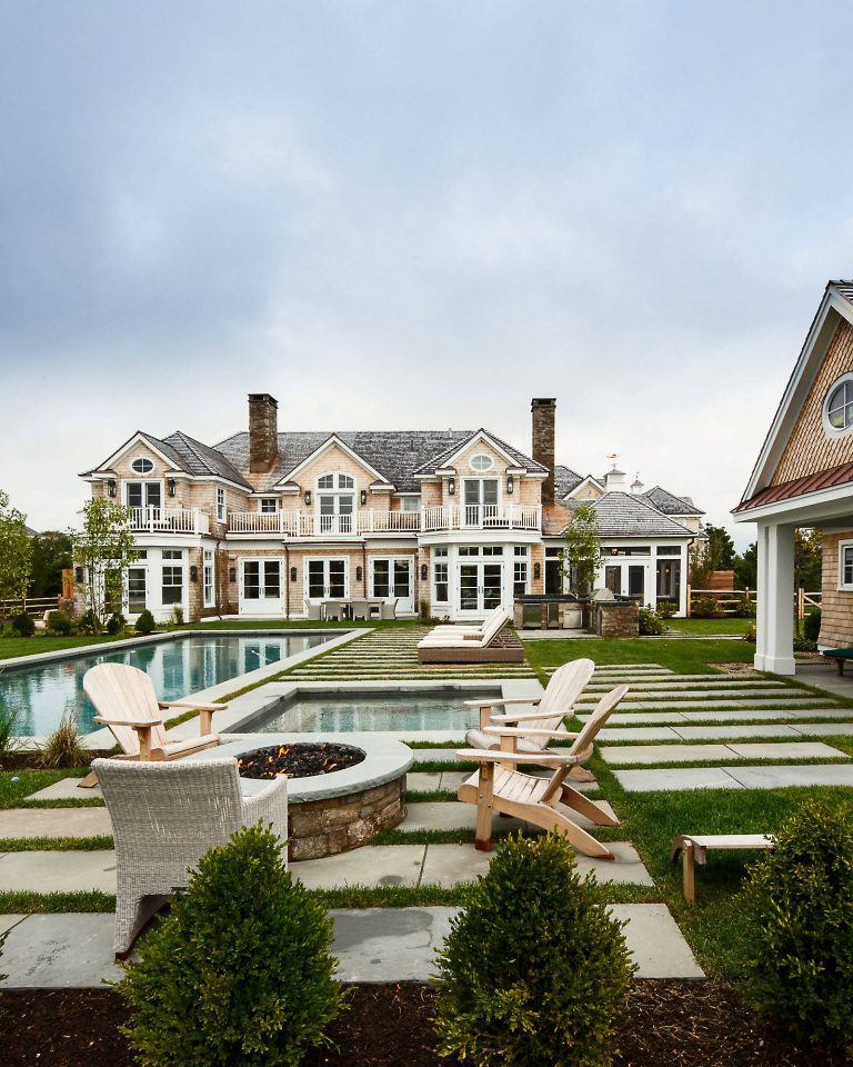 Hot tub - large transitional backyard rectangular and concrete paver hot tub idea in Boston