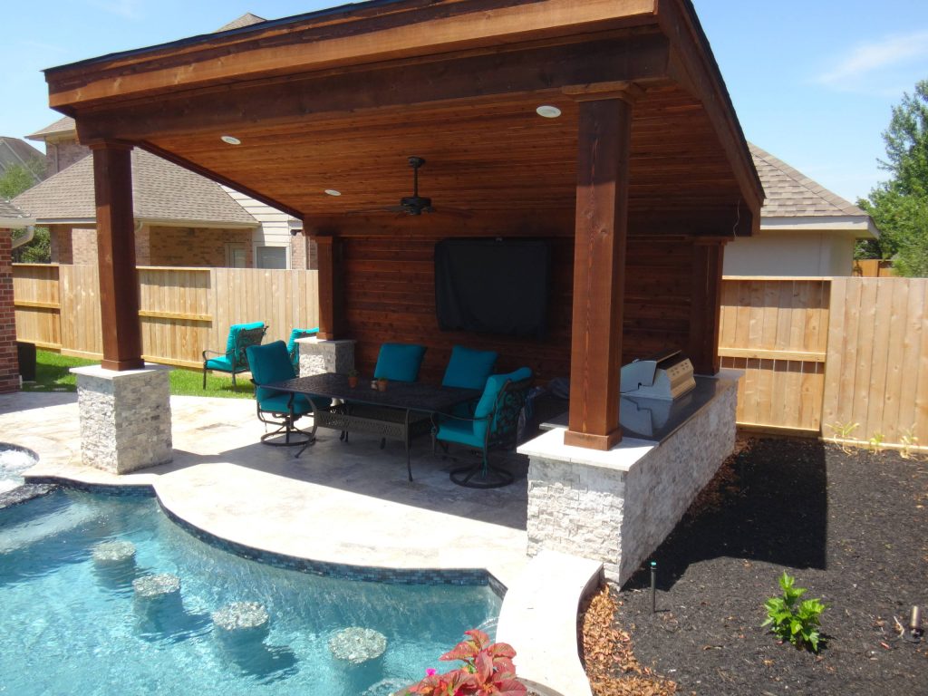 Hot tub - large transitional backyard stone and custom-shaped lap hot tub idea in Houston