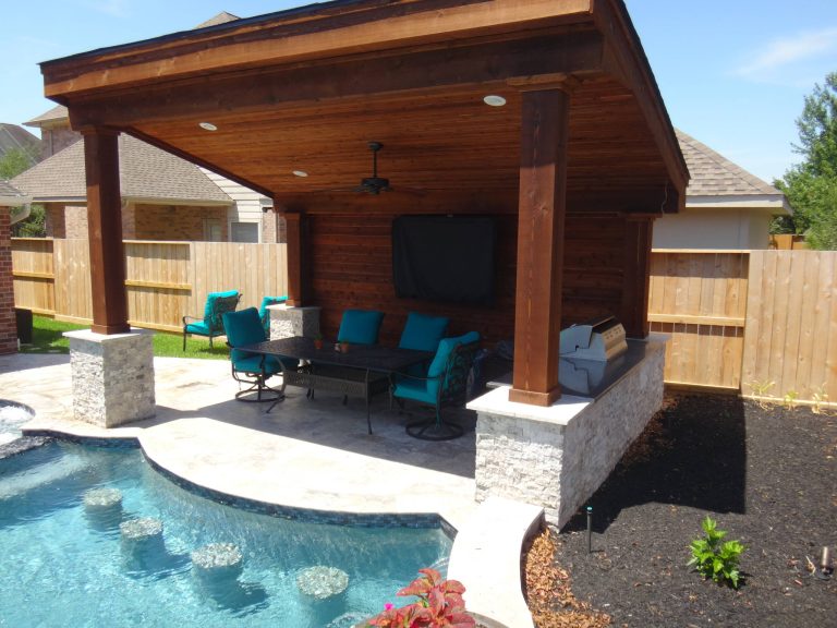 Hot tub - large transitional backyard stone and custom-shaped lap hot tub idea in Houston