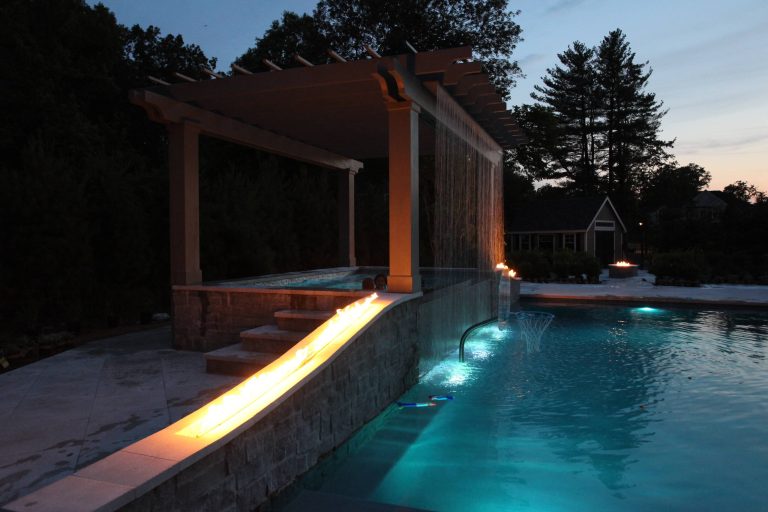 Hot tub - large transitional backyard tile and rectangular lap hot tub idea in New York