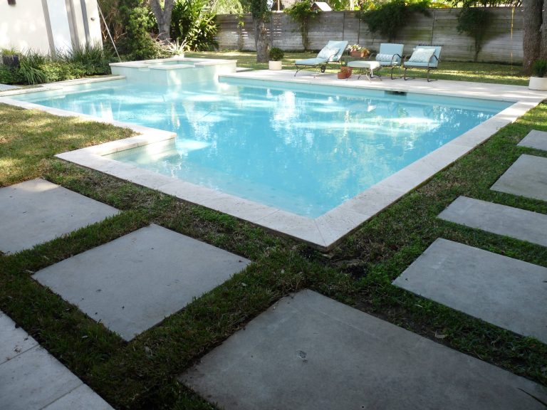 Hot tub - mid-sized backyard concrete and rectangular lap hot tub idea in Houston