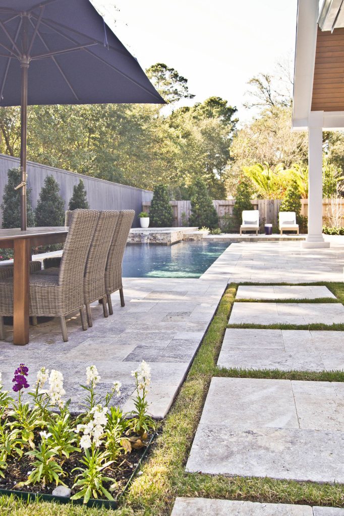 Hot tub - small modern backyard stone and custom-shaped hot tub idea in Houston