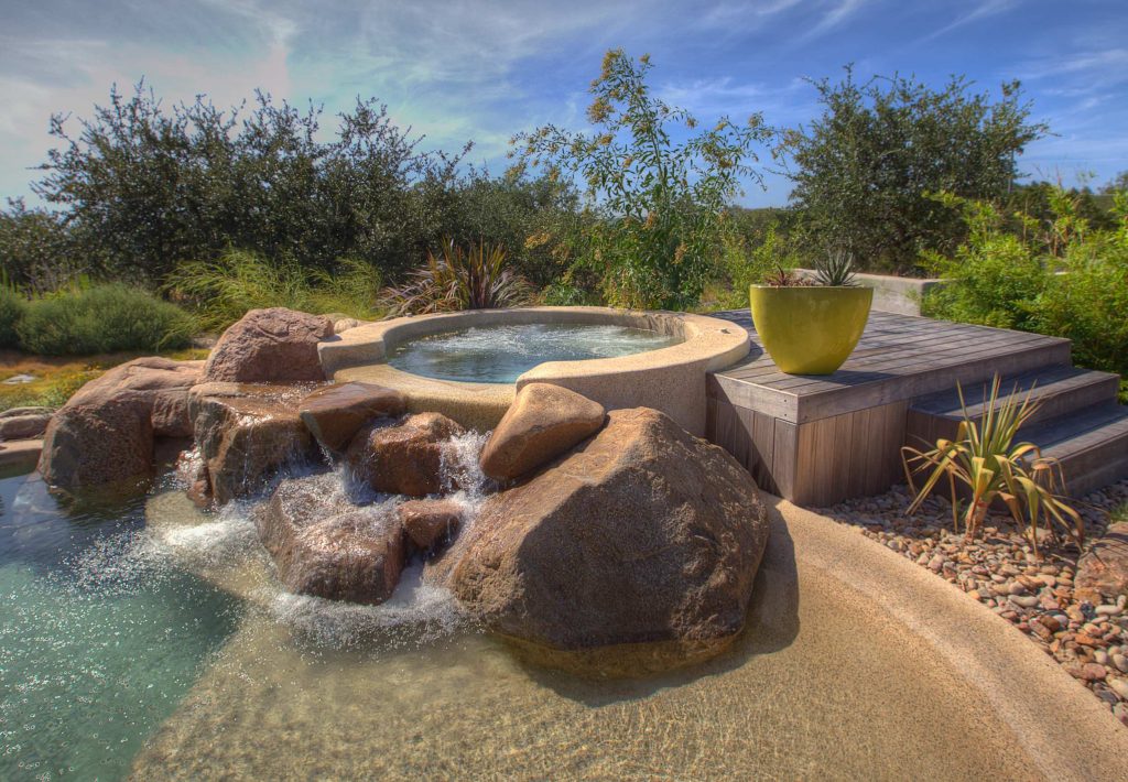 Hot tub - southwestern natural hot tub idea in Austin