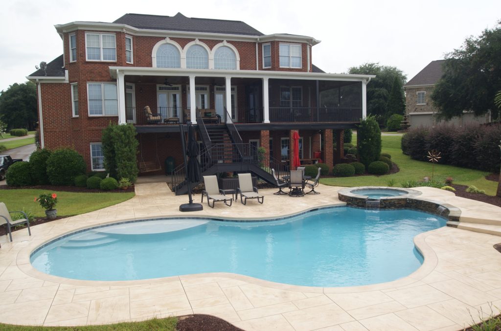 Hot tub - traditional backyard custom-shaped lap hot tub idea in Other
