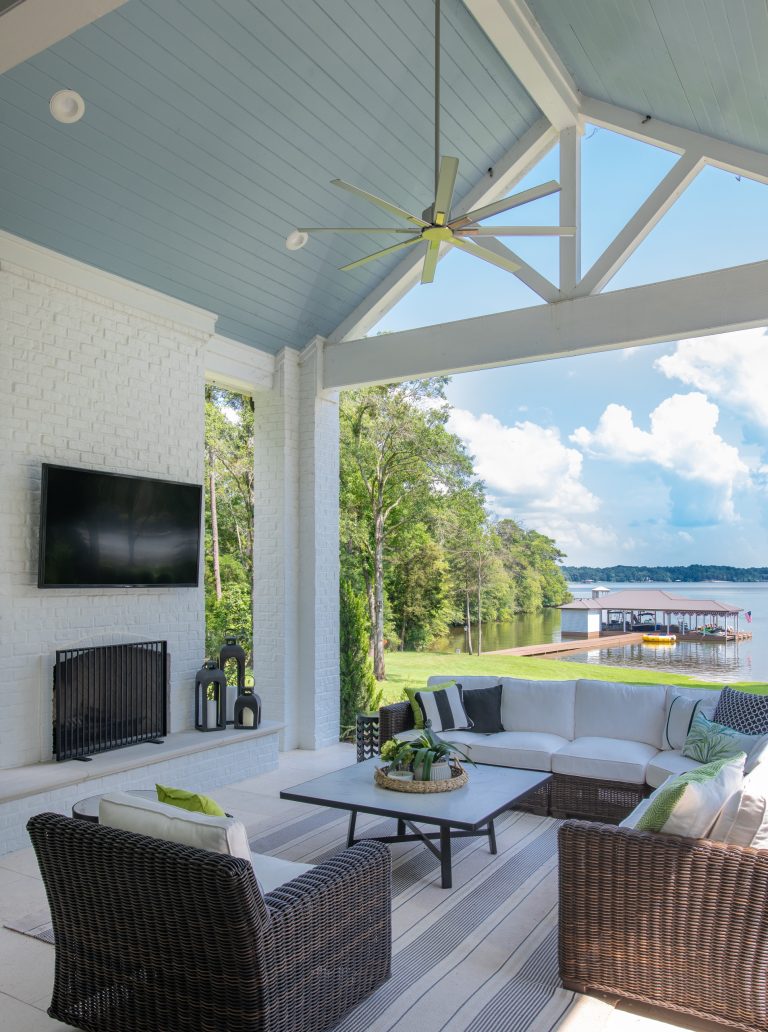 Huge beach style stone back porch photo in Dallas with a fireplace and a roof extension by BGI Design | Outdoor Photos | Porch | Landscaping | Landscape Design | Outdoor Living Space | Porch Design Ideas | Outdoor Living Space Ideas | Backyard Design