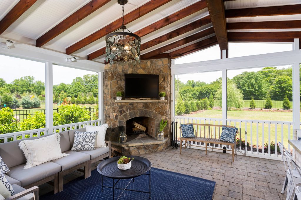 Huge cottage concrete paver screened-in back porch idea in Charlotte with a roof extension by The Stone Man | Outdoor Photos | Porch | Landscaping | Landscape Design | Outdoor Living Space | Porch Design Ideas | Outdoor Living Space Ideas | Backyard Design