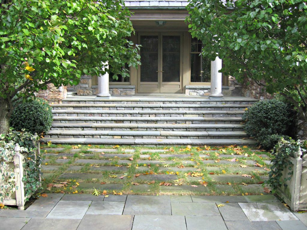 Huge country stone front porch photo in New York by Coppola & Sons Construction Company | Outdoor Photos | Porch | Landscaping | Landscape Design | Outdoor Living Space | Porch Design Ideas | Outdoor Living Space Ideas | Backyard Design
