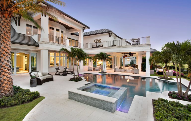 Huge transitional backyard custom-shaped hot tub photo in Miami