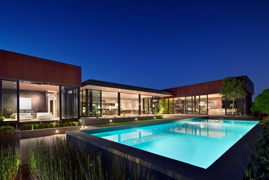 Huge trendy backyard concrete and rectangular aboveground pool house photo in Los Angeles