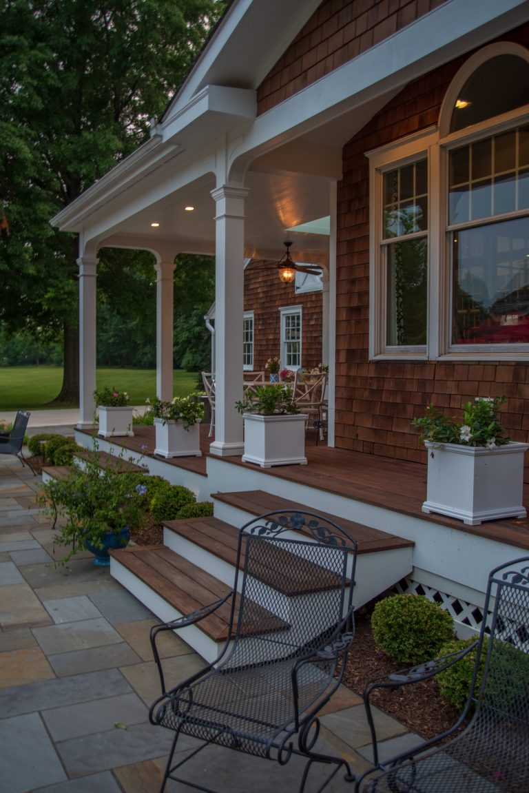 In the multi-phase project, a series of outdoor porches was added to connect the new master suite addition and the existing public spaces.