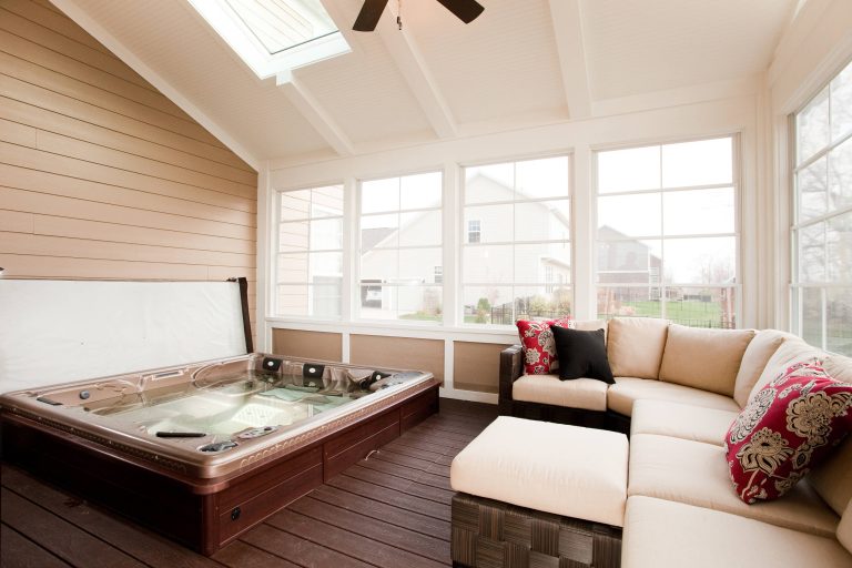 Indoor hot tub built into the floor makes winter-time use especially enjoyable. We included a hidden door in the floor for access to mechanicals .