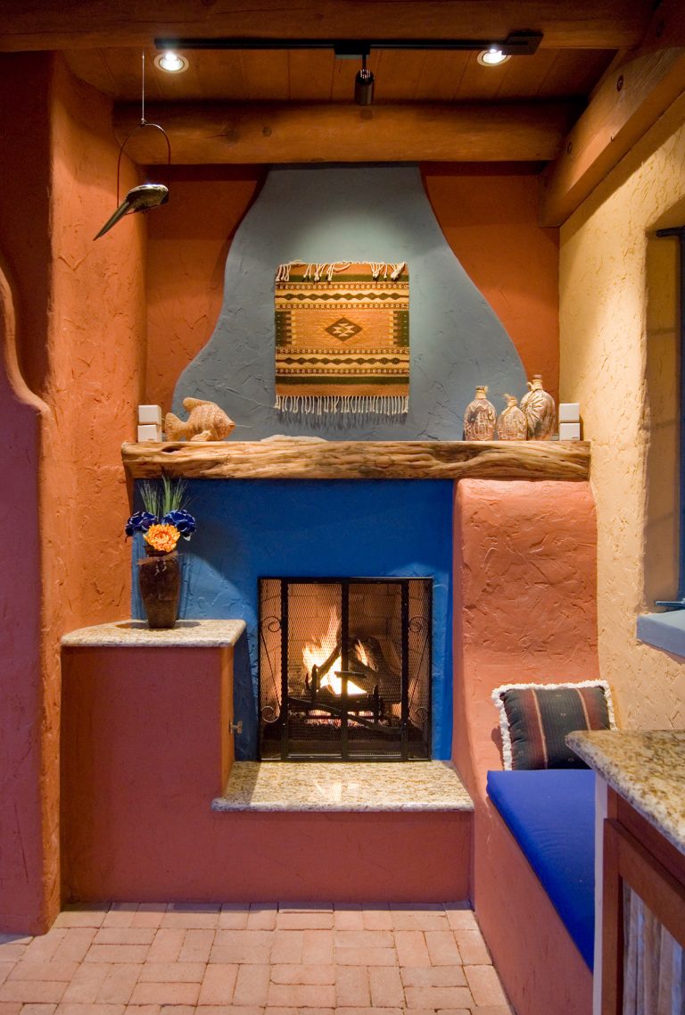 Indoor-outdoor kitchen and dining area created in the pool cabana area. Photo - John Sartin