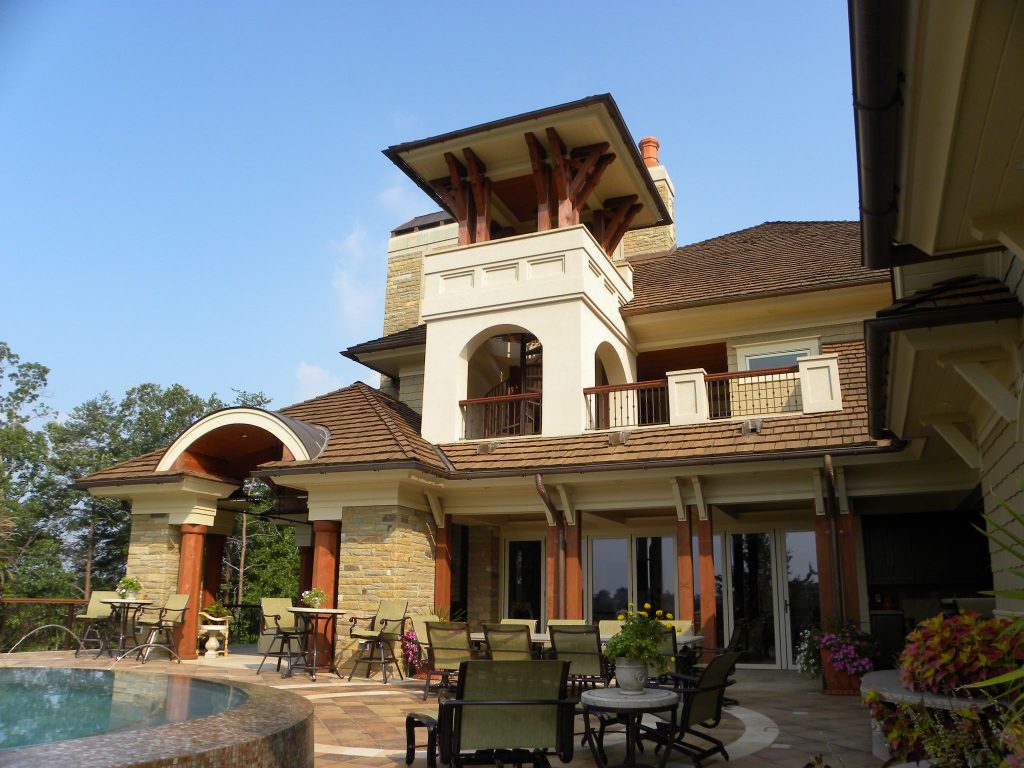 Inspiration for a backyard tile patio kitchen remodel in Charlotte with a roof extension