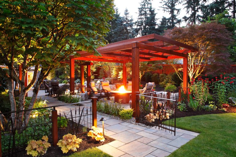 Inspiration for a brick porch remodel in Seattle with a roof extension by Alderwood Landscape Architecture and Construction | Outdoor Photos | Porch | Landscaping | Landscape Design | Outdoor Living Space | Porch Design Ideas | Outdoor Living Space Ideas | Backyard Design