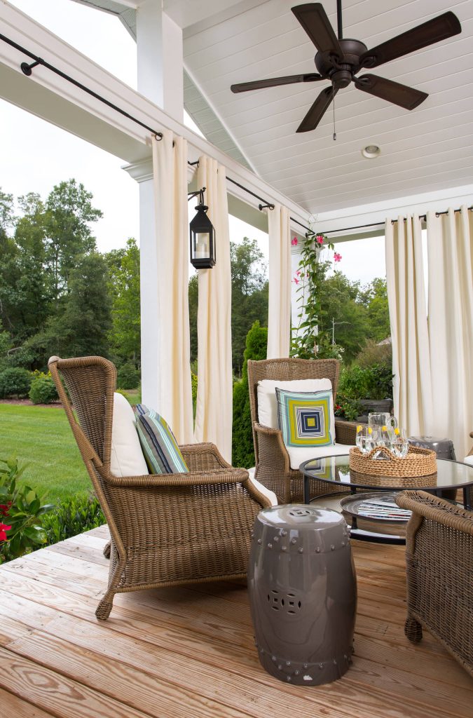 Inspiration for a coastal back porch remodel in Charlotte with decking and a roof extension by | Outdoor Photos | Porch | Landscaping | Landscape Design | Outdoor Living Space | Porch Design Ideas | Outdoor Living Space Ideas | Backyard Design