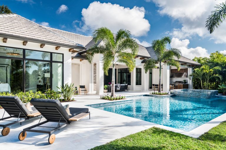Inspiration for a coastal backyard custom-shaped and tile lap hot tub remodel in Other