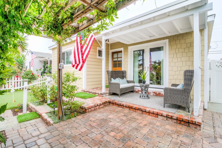 Inspiration for a coastal porch remodel in Orange County by Beach Town Staging | Outdoor Photos | Porch | Landscaping | Landscape Design | Outdoor Living Space | Porch Design Ideas | Outdoor Living Space Ideas | Backyard Design