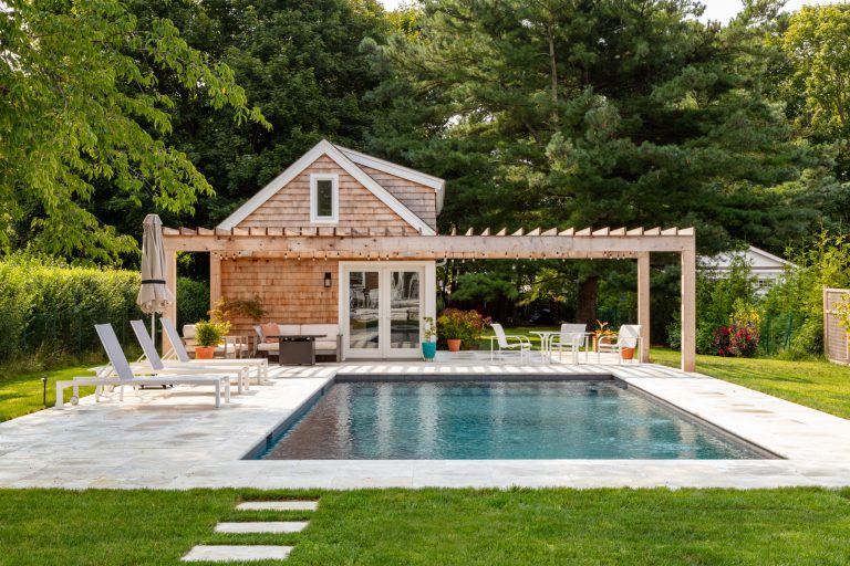 Inspiration for a coastal rectangular pool remodel in New York