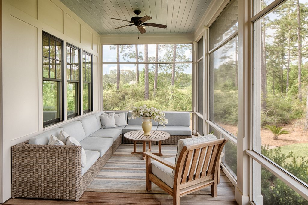 Inspiration for a coastal screened-in back porch remodel in Atlanta with decking and a roof extension by Pearce Scott Architects | Outdoor Photos | Porch | Landscaping | Landscape Design | Outdoor Living Space | Porch Design Ideas | Outdoor Living Space Ideas | Backyard Design