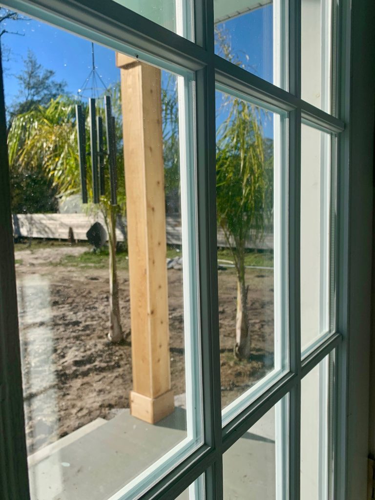 Inspiration for a concrete back porch remodel in Jacksonville with a roof extension by Kurco Construction, Inc | Outdoor Photos | Porch | Landscaping | Landscape Design | Outdoor Living Space | Porch Design Ideas | Outdoor Living Space Ideas | Backyard Design