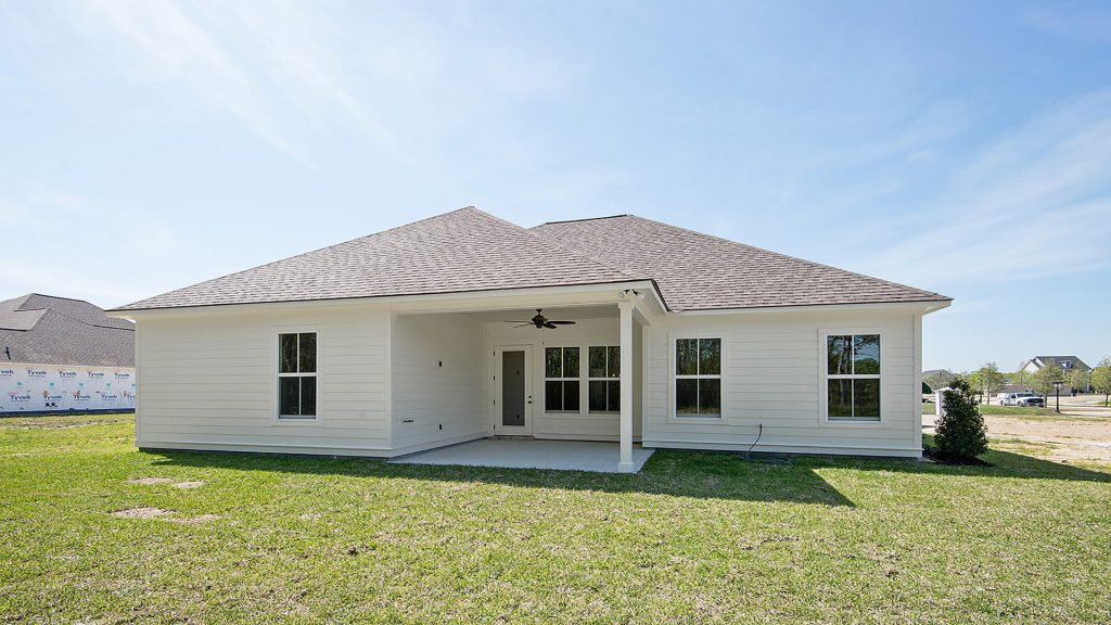 Inspiration for a concrete back porch remodel in New Orleans with a roof extension by HU-407696 | Outdoor Photos | Porch | Landscaping | Landscape Design | Outdoor Living Space | Porch Design Ideas | Outdoor Living Space Ideas | Backyard Design