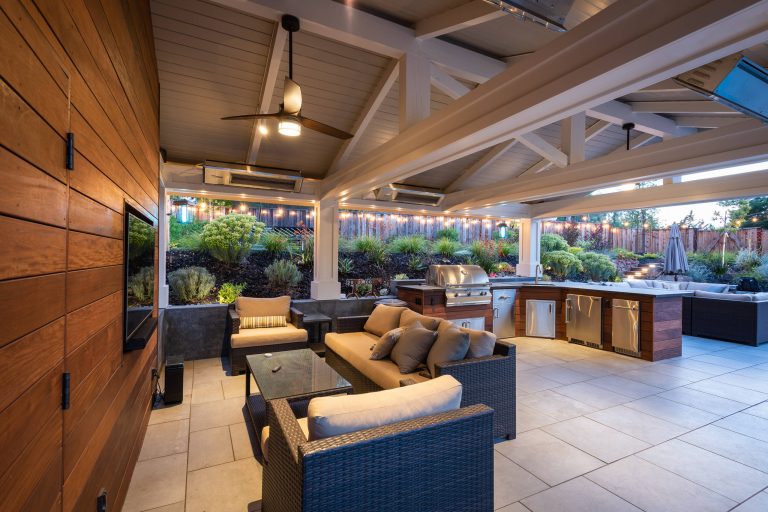 Inspiration for a contemporary backyard patio kitchen remodel in San Francisco with a gazebo