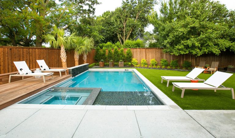 Inspiration for a contemporary backyard rectangular hot tub remodel in Dallas