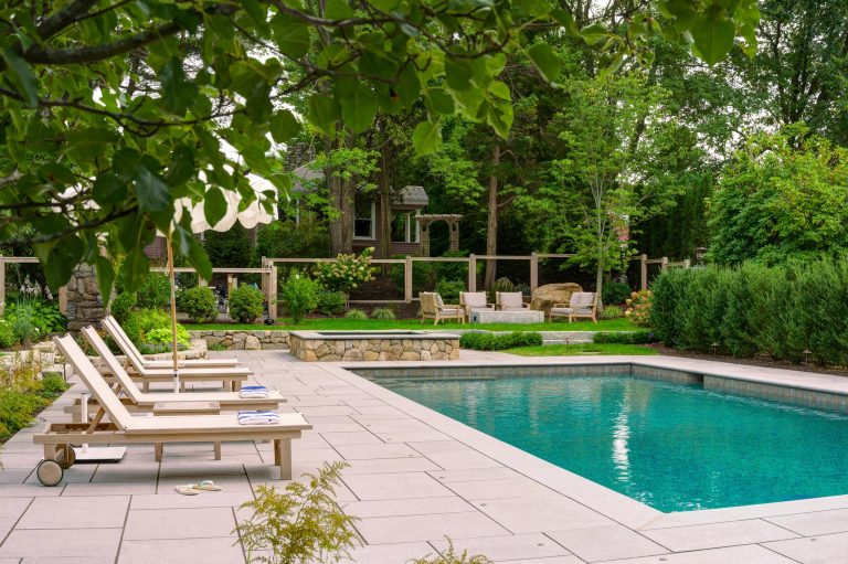 Inspiration for a contemporary backyard tile and rectangular hot tub remodel in Boston