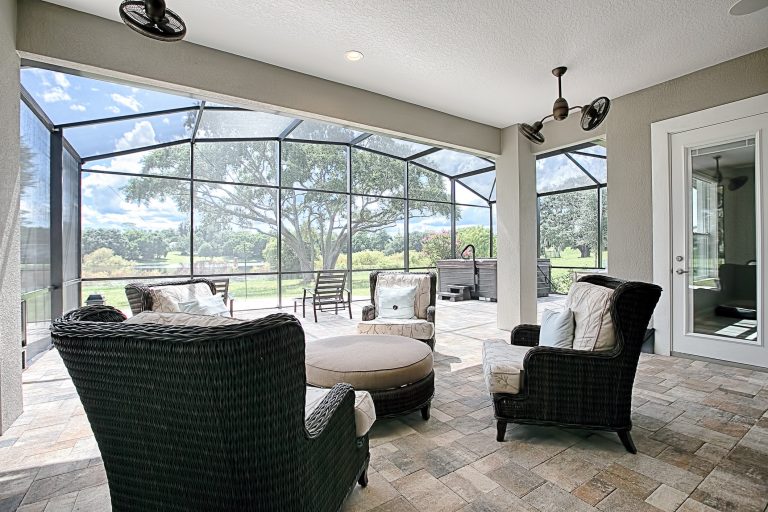 Inspiration for a contemporary brick screened-in back porch remodel in Orlando by Kevco Builders | Outdoor Photos | Porch | Landscaping | Landscape Design | Outdoor Living Space | Porch Design Ideas | Outdoor Living Space Ideas | Backyard Design