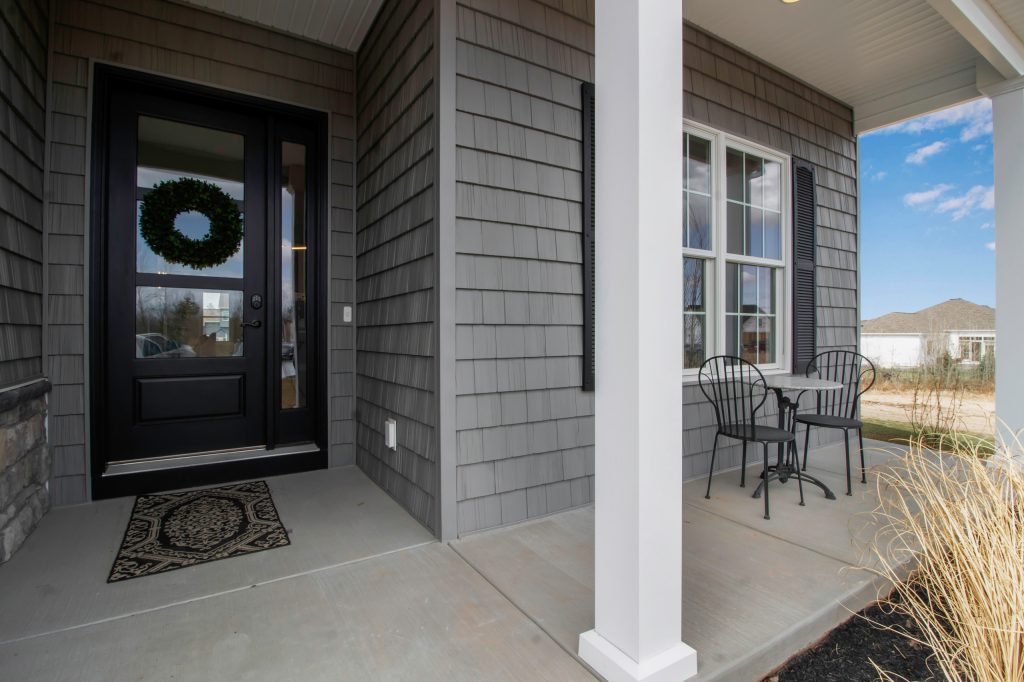 Inspiration for a contemporary porch remodel in New York by Designer Homes of WNY, LLC | Outdoor Photos | Porch | Landscaping | Landscape Design | Outdoor Living Space | Porch Design Ideas | Outdoor Living Space Ideas | Backyard Design