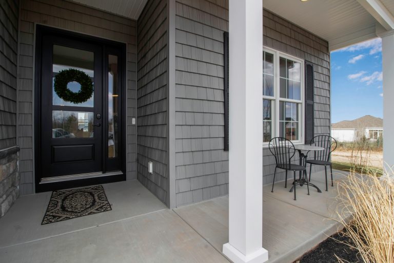 Inspiration for a contemporary porch remodel in New York by Designer Homes of WNY, LLC | Outdoor Photos | Porch | Landscaping | Landscape Design | Outdoor Living Space | Porch Design Ideas | Outdoor Living Space Ideas | Backyard Design