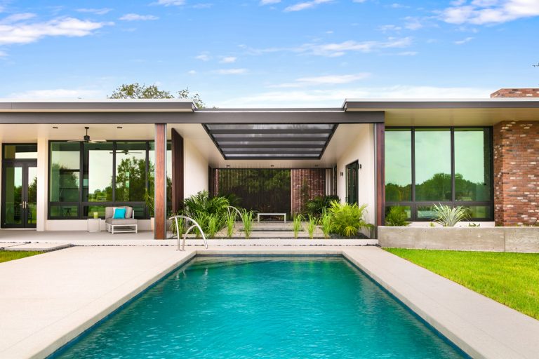Inspiration for a contemporary rectangular pool remodel in Tampa