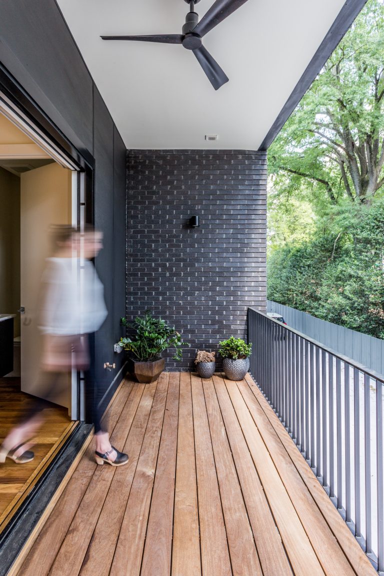 Inspiration for a contemporary second story metal railing deck remodel in Raleigh
