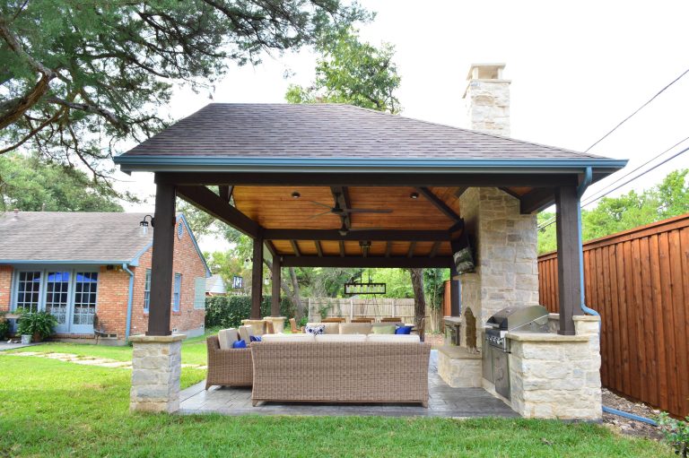 Inspiration for a cottage backyard stamped concrete patio kitchen remodel in Dallas