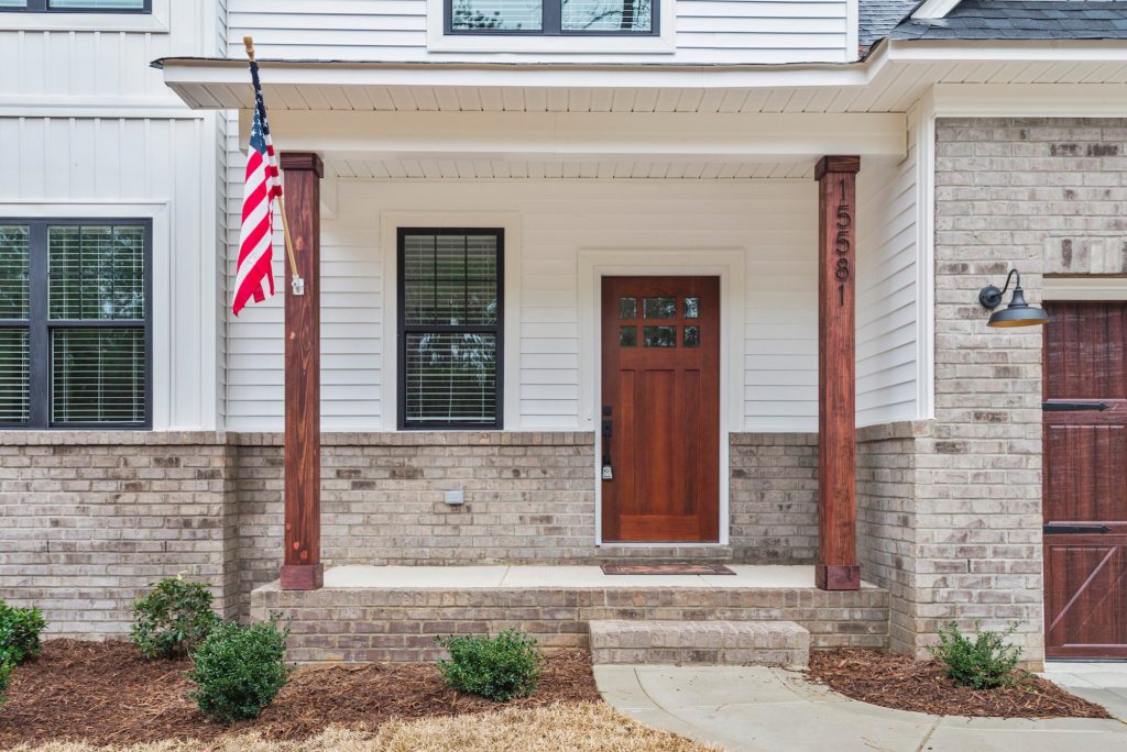 Inspiration for a cottage porch remodel in Raleigh by Precision Custom Homes | Outdoor Photos | Porch | Landscaping | Landscape Design | Outdoor Living Space | Porch Design Ideas | Outdoor Living Space Ideas | Backyard Design