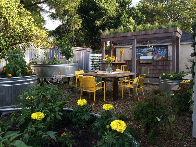 Inspiration for a country backyard patio kitchen remodel in Other with no cover