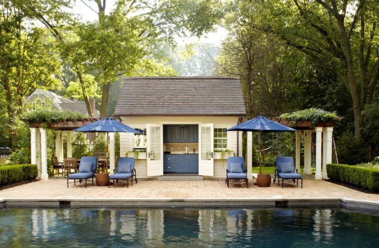 Inspiration for a country brick pool house remodel in New York