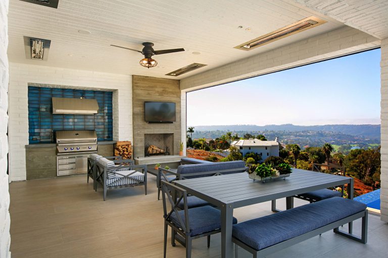 Inspiration for a country patio kitchen remodel in San Diego with a roof extension